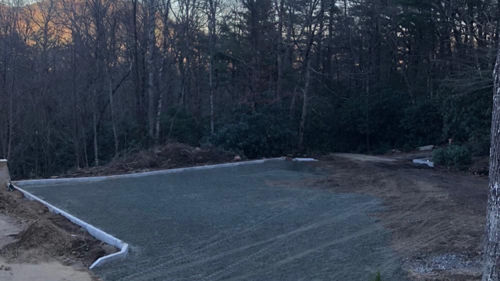Installing gravel pavers on steep drive at mountain lodge in North Carolina