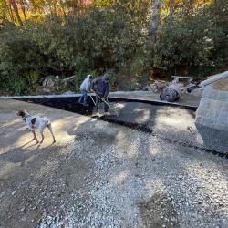 Raking gravel into NDS gravel pavers